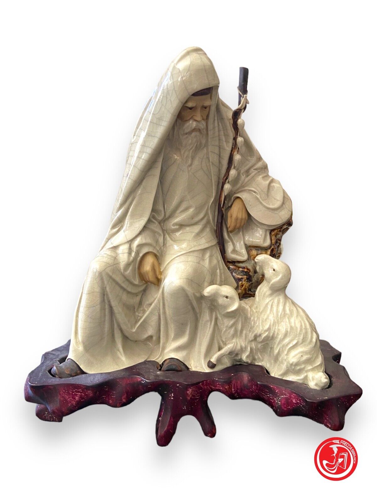 Anziano pastore in ceramica su base in legno