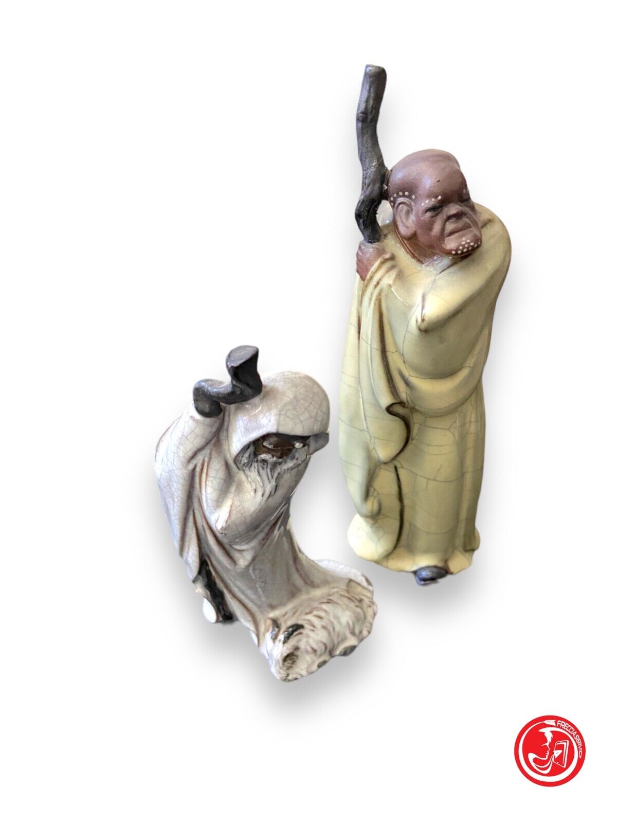Coppia di statuette in ceramica