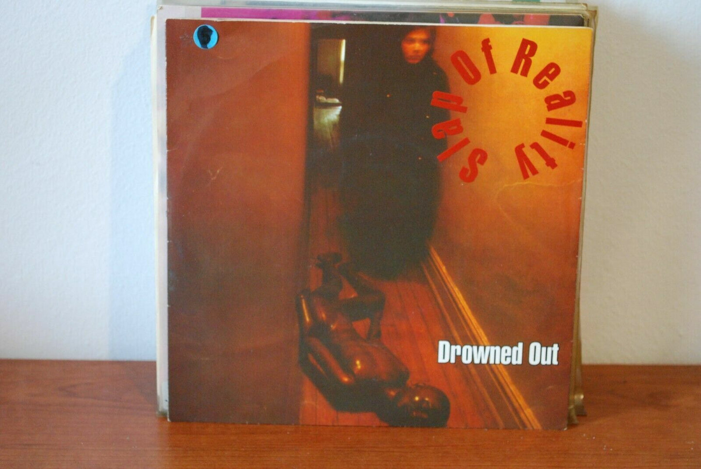 Slap Of Reality – Drowned Out
