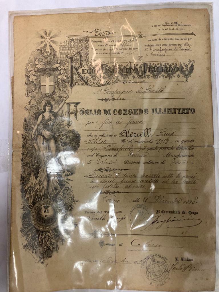 World War II discharge medal with discharge sheet