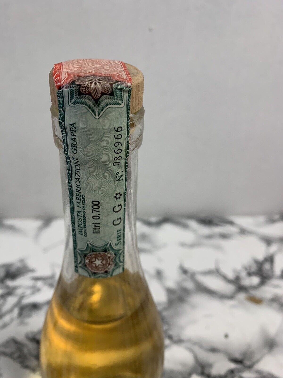 Bottiglia Grappa di vinaccia Reano