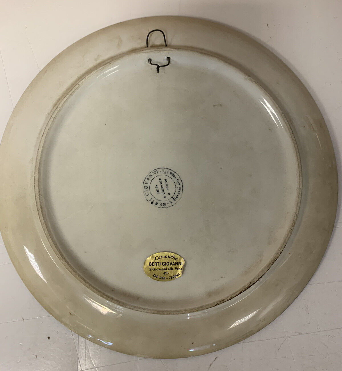 Hand-decorated ceramic plate