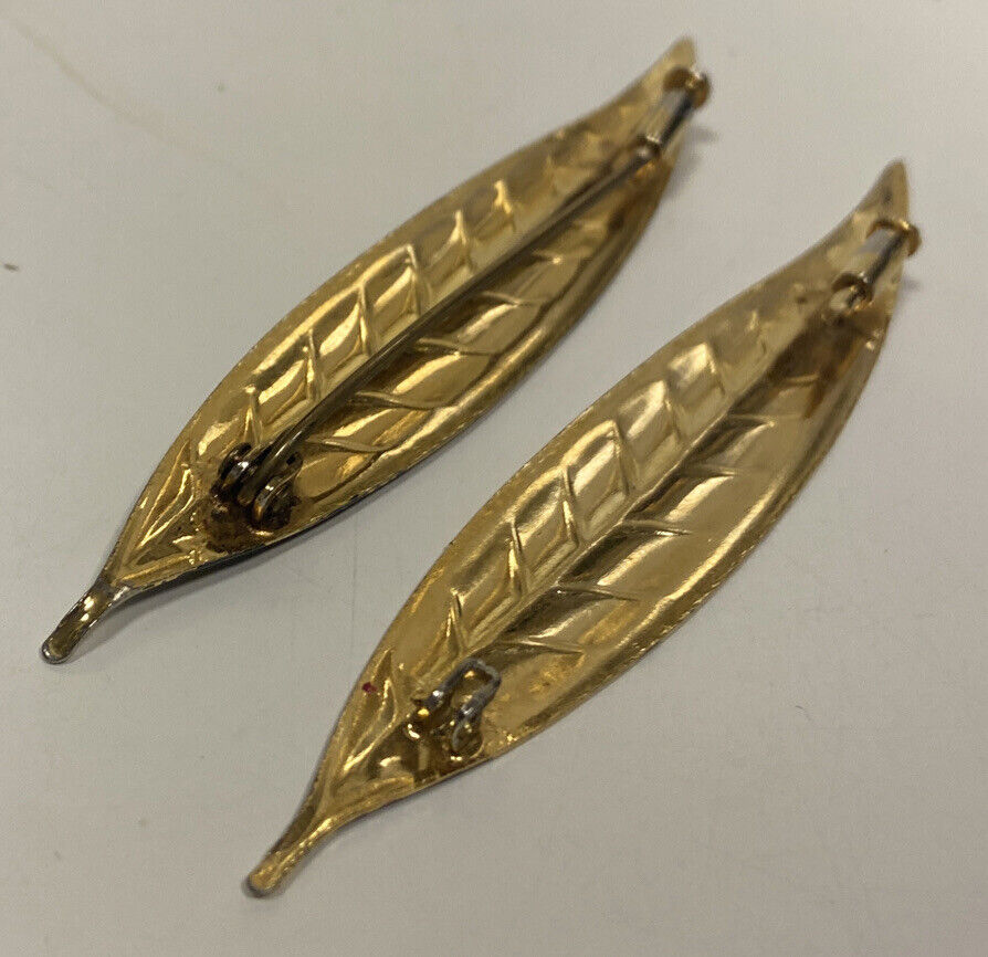 2 belles broches feuilles dorées
