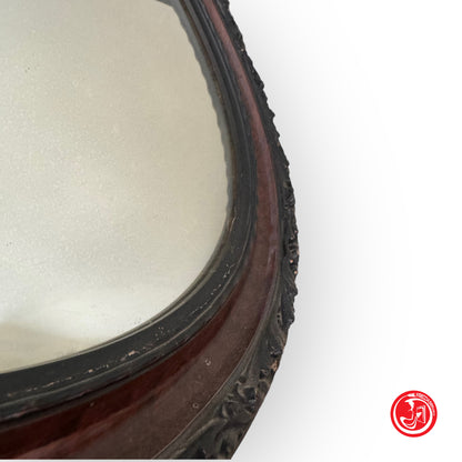 Oval mirror with elegant wooden frame