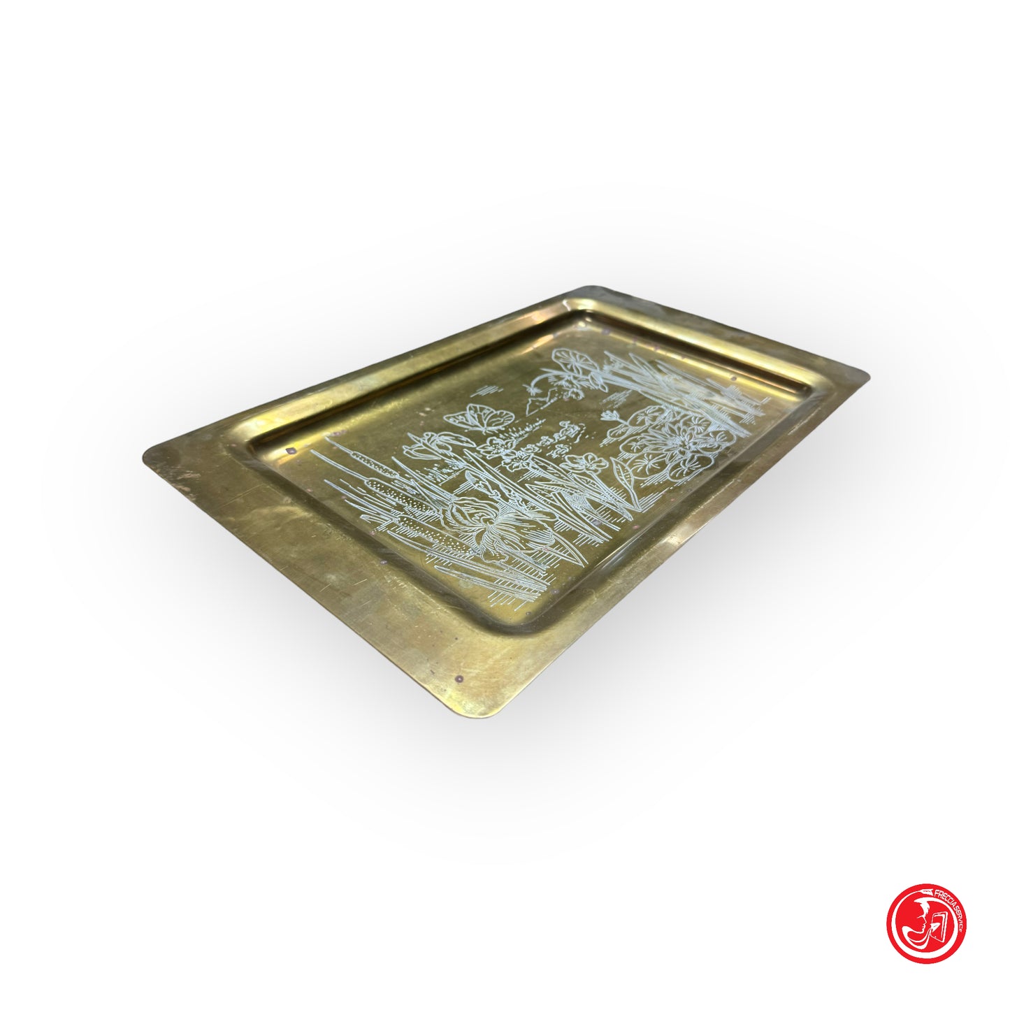 Metal tray with engraved decorations