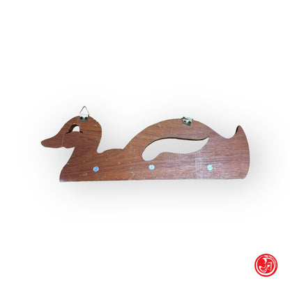 Wooden duck-shaped clothes hanger