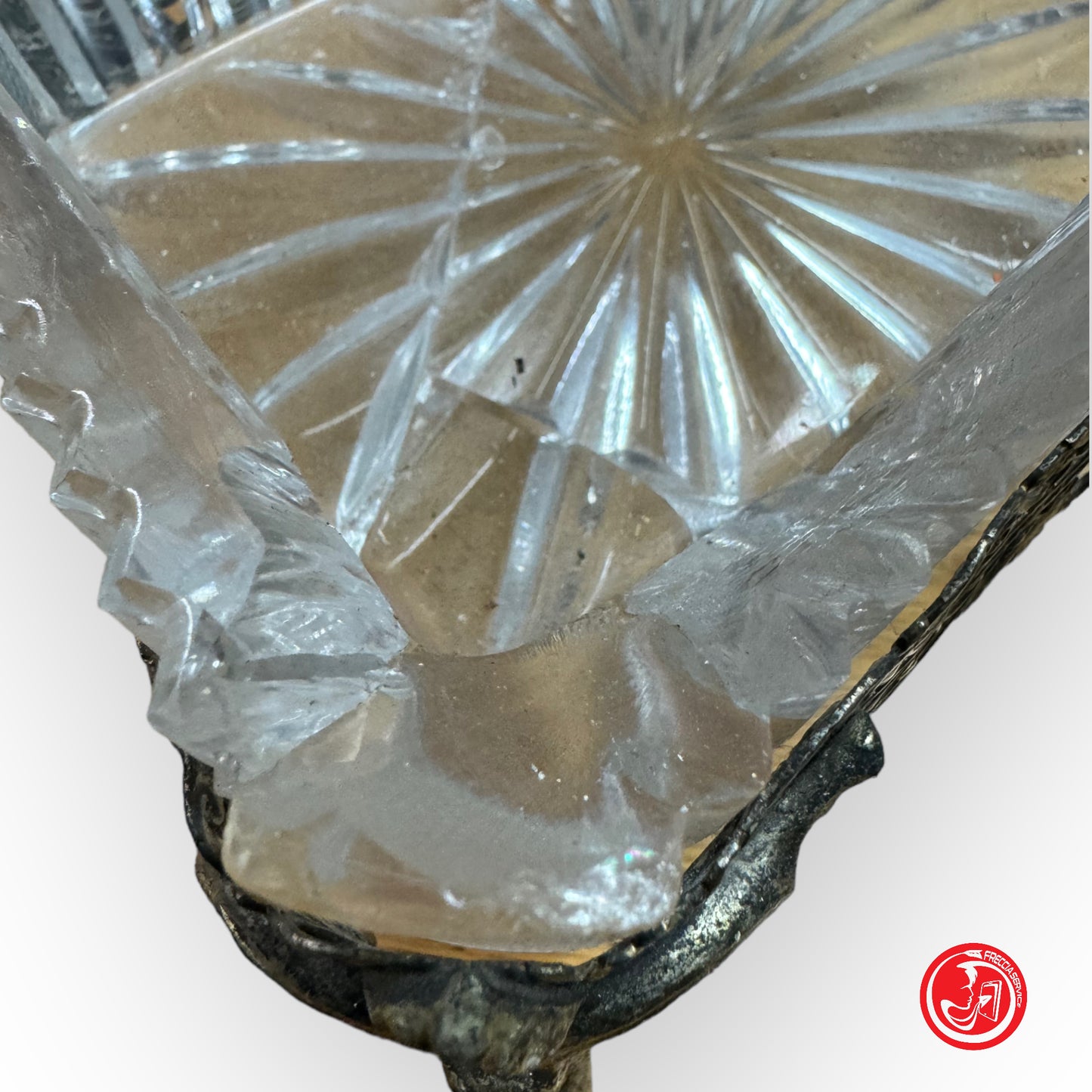 Glass ashtray with steel support