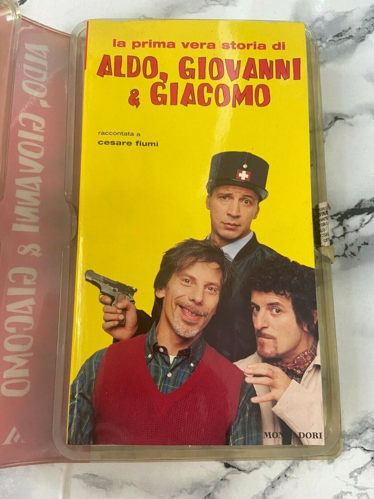 Videocassetta + Libro - Aldo, Giovanni & Giacomo