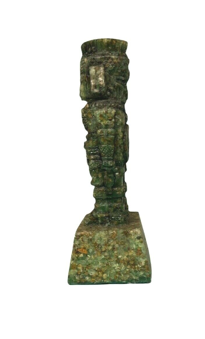 Totem statue in green crystal mineral stone