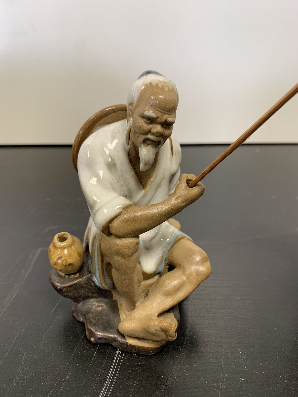 Figurines de pêcheurs asiatiques