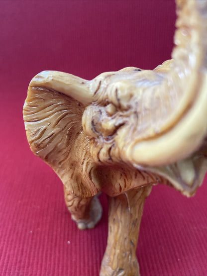 Elephant Statue "LUCKY CHARM" trumpeting in Resin