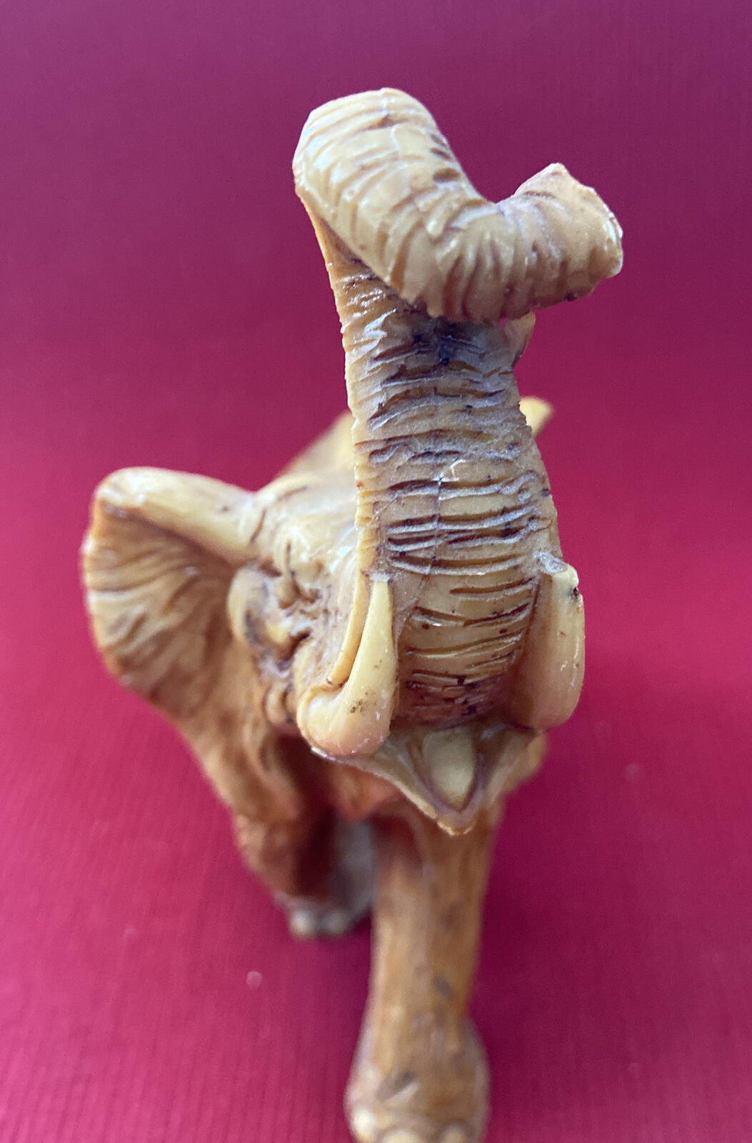 Elephant Statue "LUCKY CHARM" trumpeting in Resin