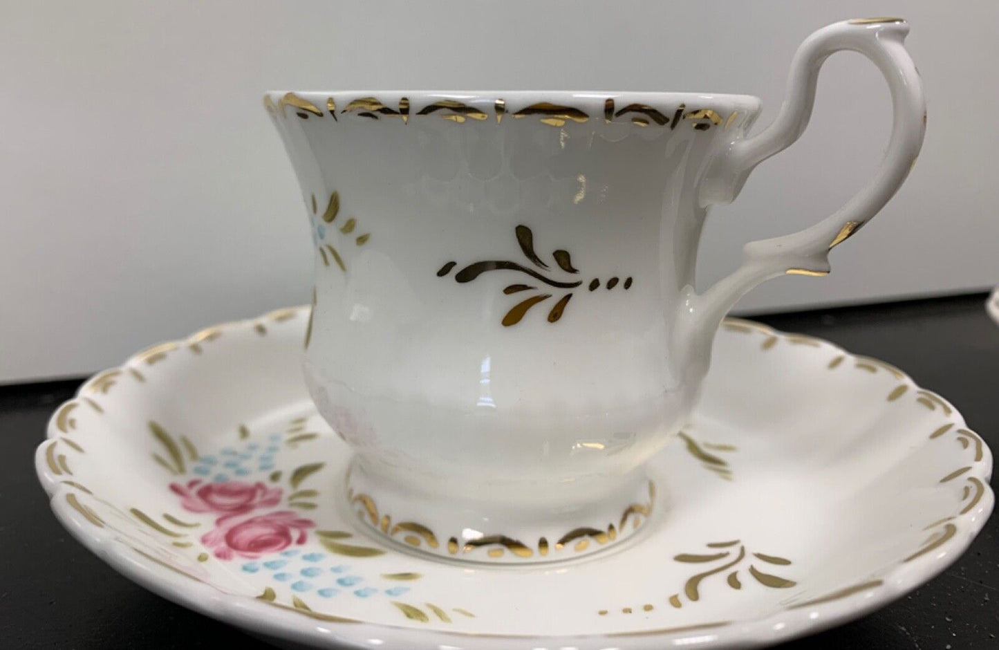 Set of 6 baroque porcelain coffee cups