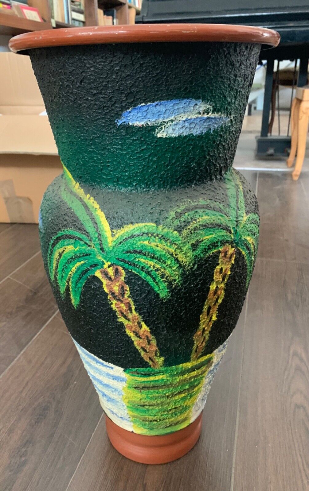 Decorated metal vase 