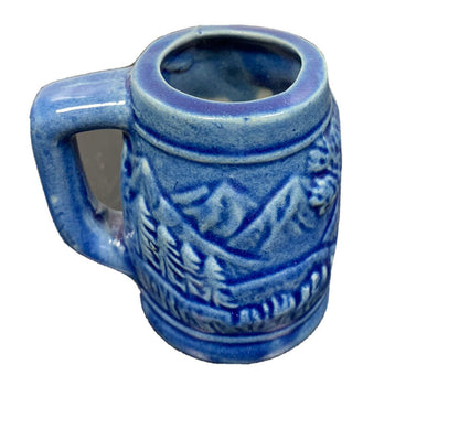 Souvenir decorated blue glass