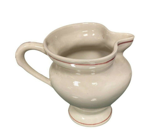 Signed ceramic jug