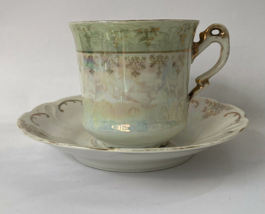 Art - Cup and saucer