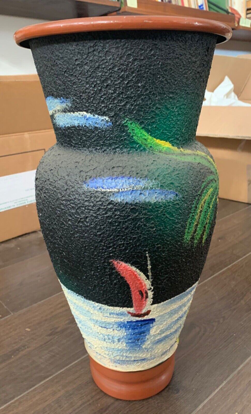 Decorated metal vase 