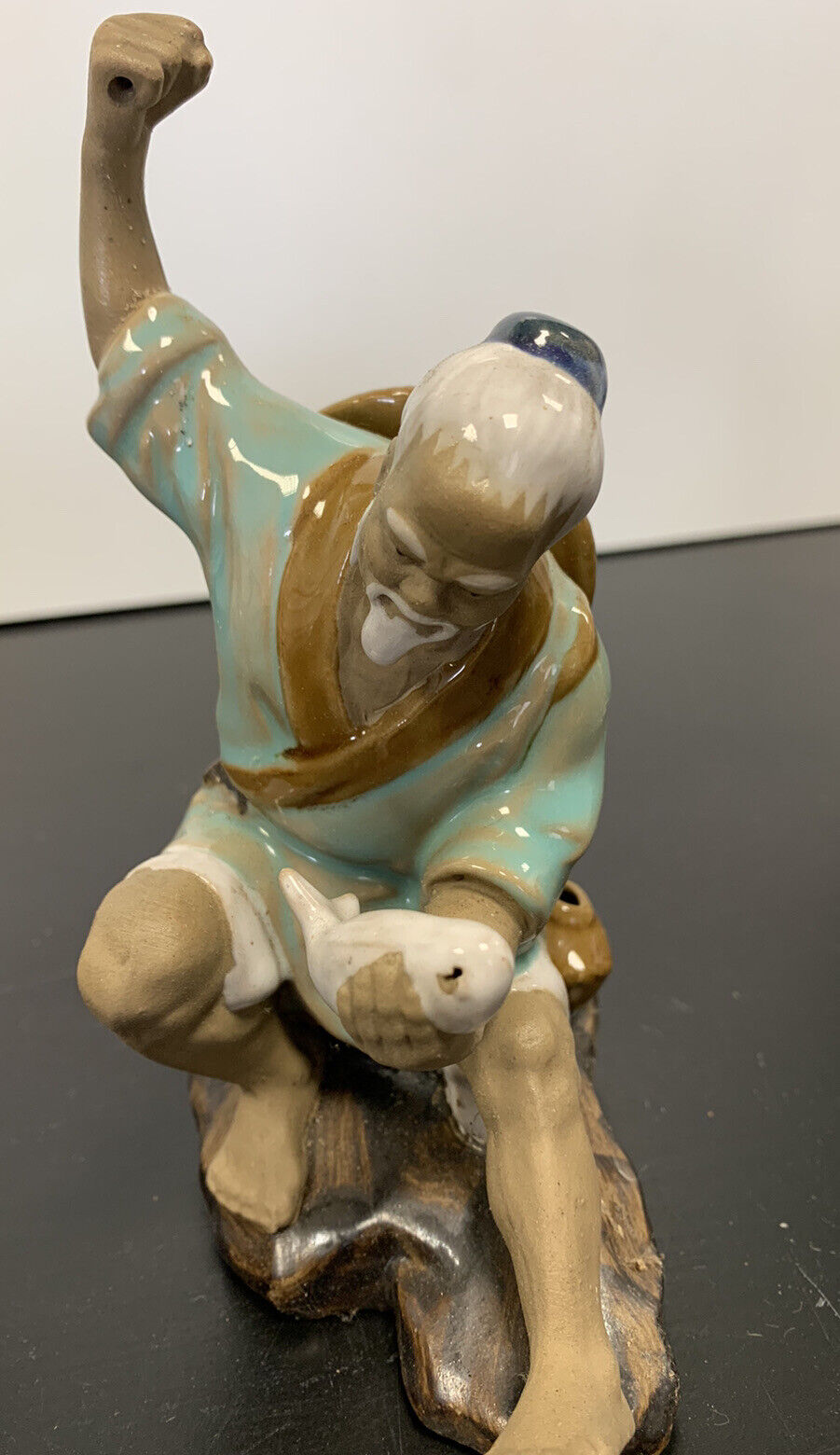 Figurines de pêcheurs asiatiques