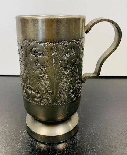 Decorated pewter glass