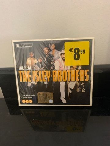 The Isley Brothers he Real... The Isley Brothers