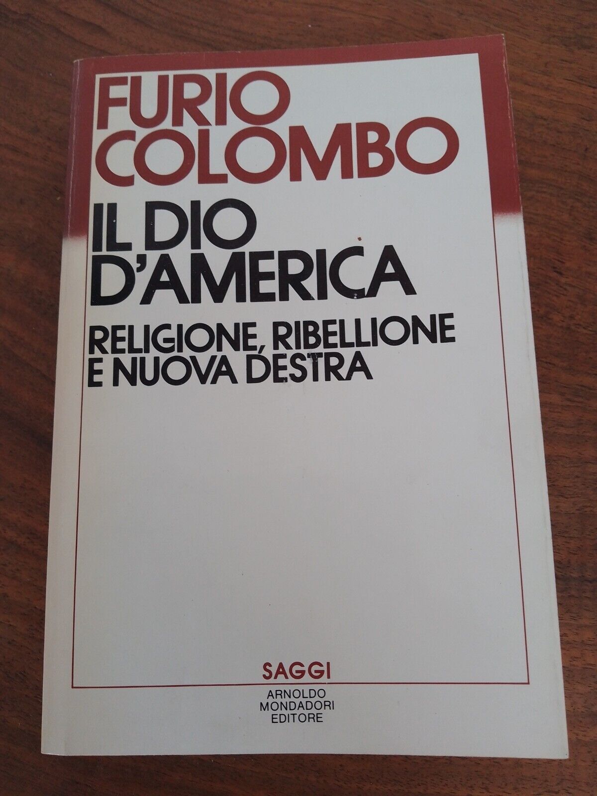 Il Dio d'America, F. Colombo, Saggi Mondadori 1983