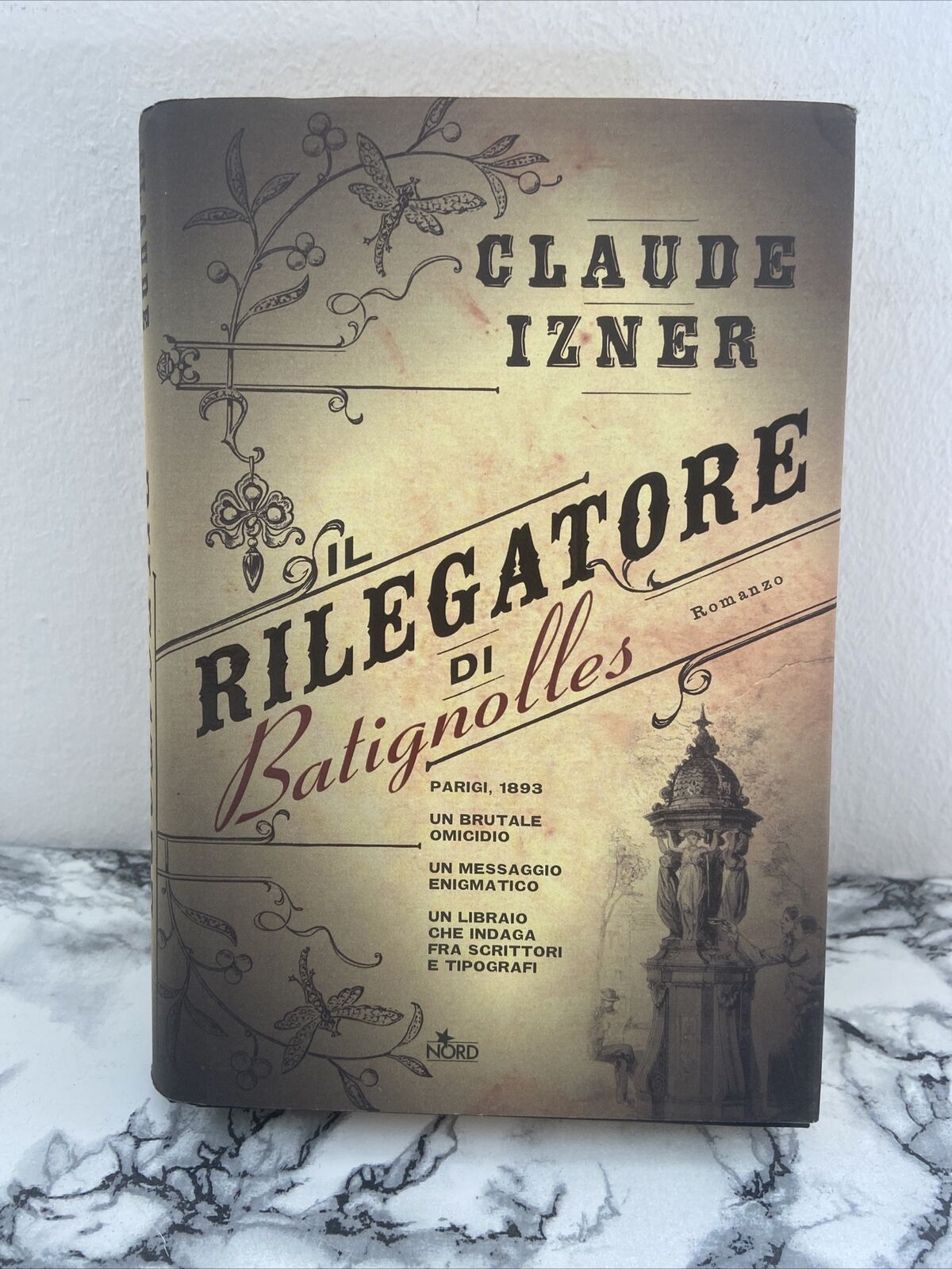 Claude Izner IL RILEGATORE DI BATIGNOLLES 1^ed. NORD Marzo 2010 cop.rigida