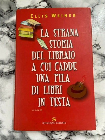 E. Weiner - L'étrange histoire du libraire qui lui fit tomber une pile de livres sur la tête