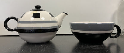 Teapot with matching cup