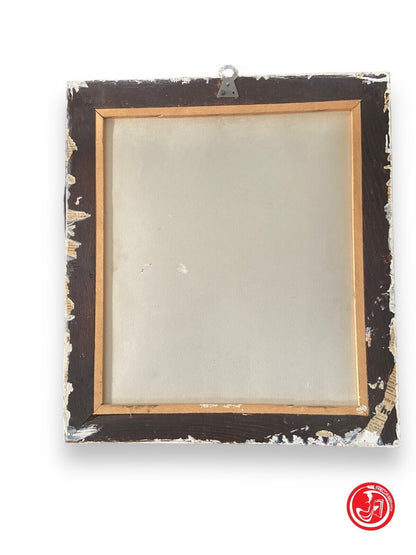 Miroir dans un cadre blanc 