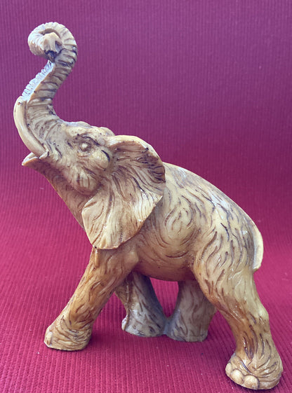 Elephant Statue "LUCKY CHARM" trumpeting in Resin