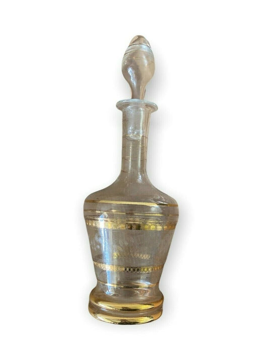 Fine glass fragrance bottle with golden decorations