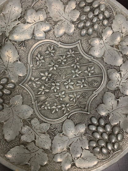 Ornate pewter wall art 