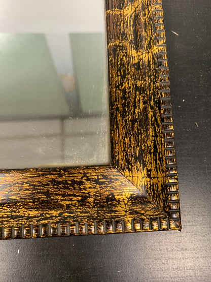 Miroir avec cadre décoré 