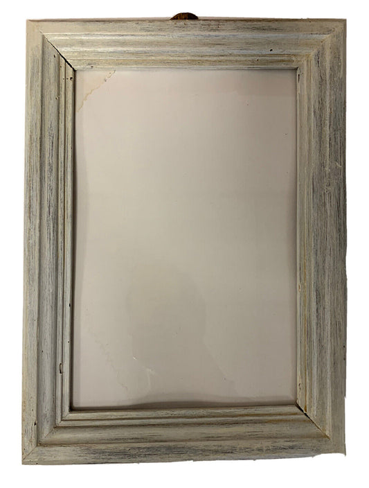 Cornice in legno grigio