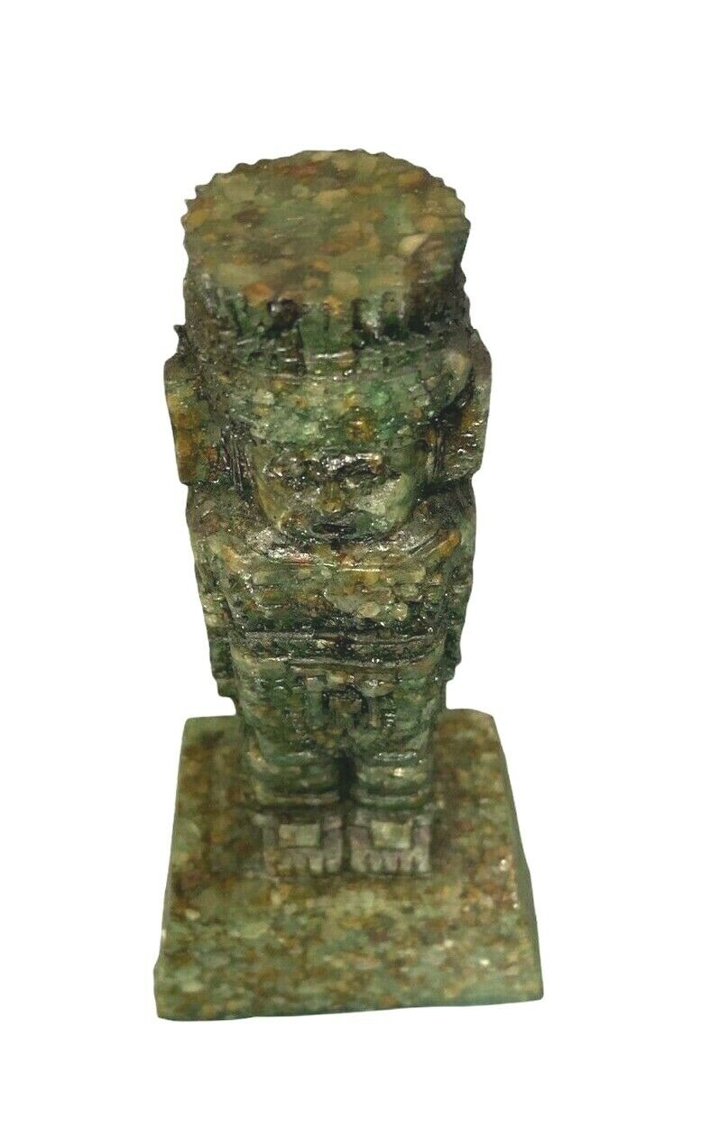 Totem statue in green crystal mineral stone